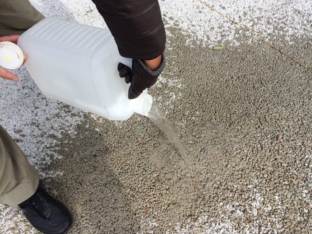 Pouring Water onto the Porous Concrete Pavement